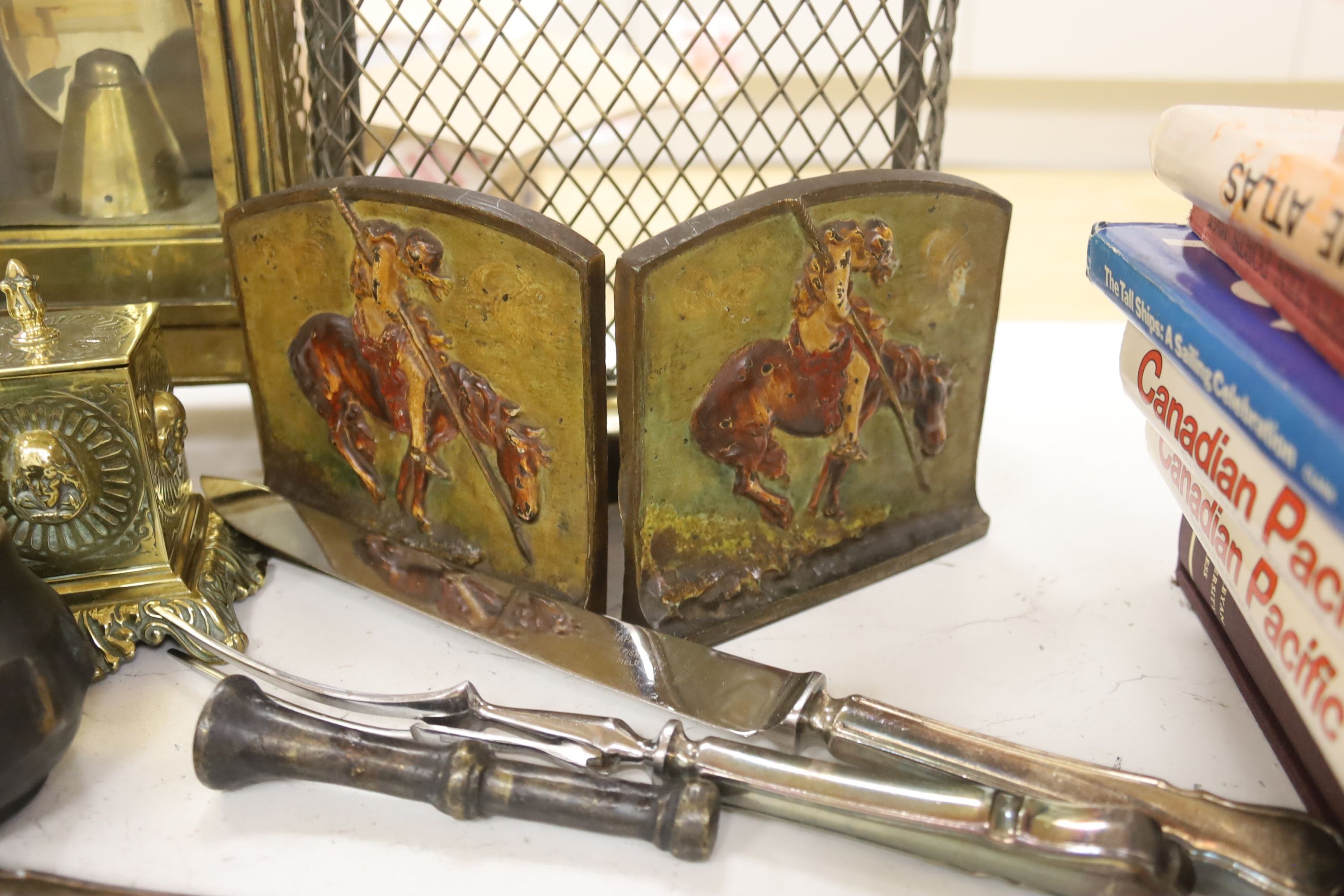 A Victorian brass spit guard, a brass railway lamp, a brass inkwell, a Queen Mary Christmas 1914 cigarette tin, a padlock, etc